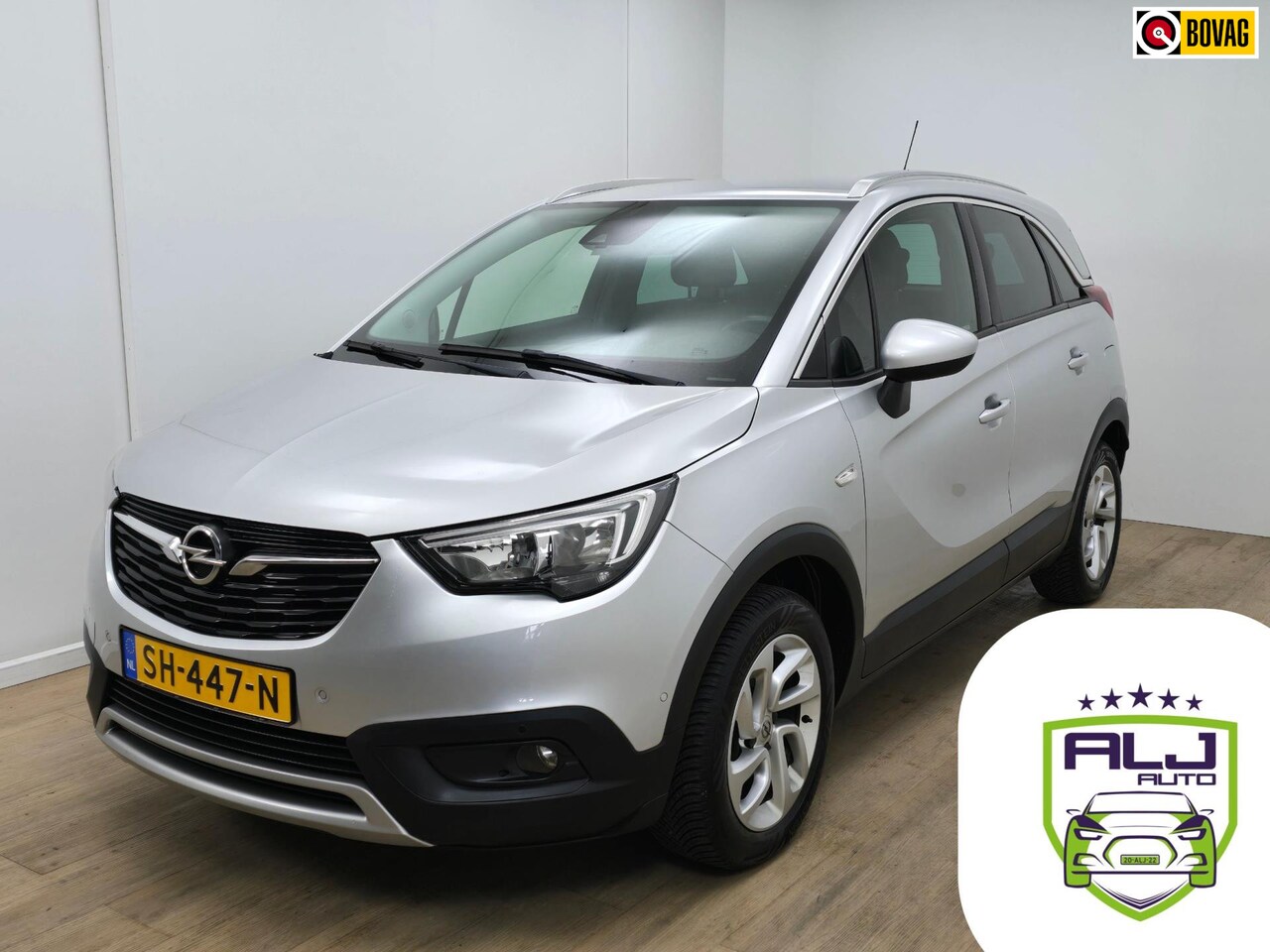 Opel Crossland X - Occasion 1.2 Turbo met parkeercamera en carplay | Tweedehands Opel Crossland X in grijs me - AutoWereld.nl