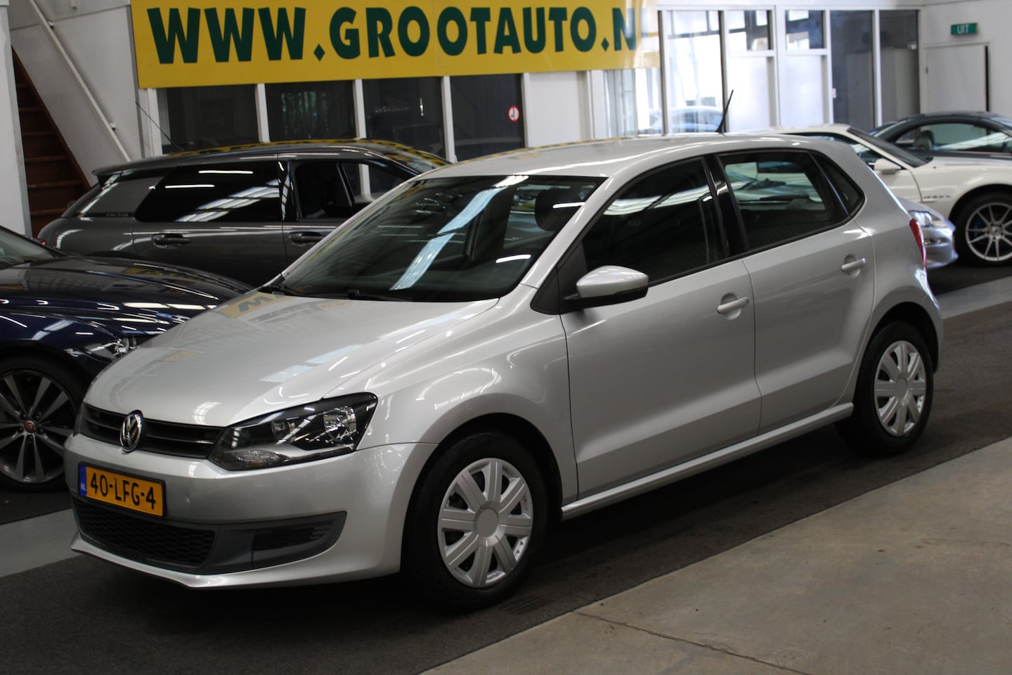 Volkswagen Polo - 1.4-16V Comfortline Airco, Cruise control, Isofix, Stuurbekrachtiging - AutoWereld.nl