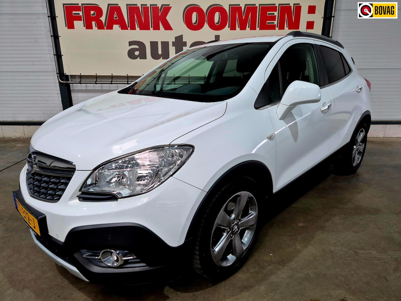 Opel Mokka - 1.4 T Cosmo 140PK + Navi|Clima|Cruise|PDC|Camera|Bluetooth|18"LMV|Leder/stof|Trekhaak|Rijk - AutoWereld.nl