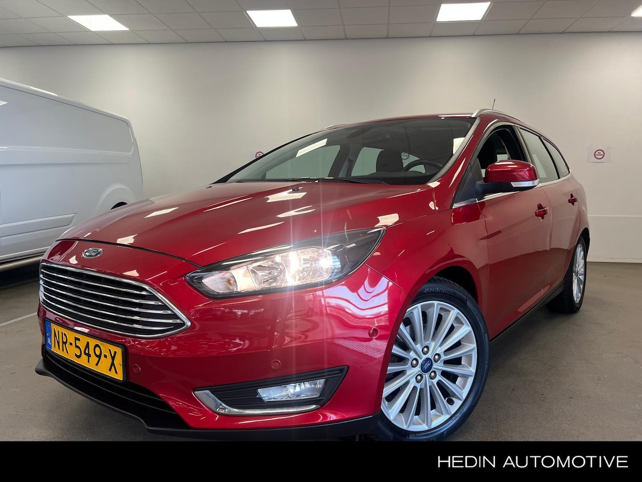 Ford Focus Wagon - 1.0 Titanium | Navi | Climate Control | Voorruitverwarming | Keyless | Cruise Control - AutoWereld.nl