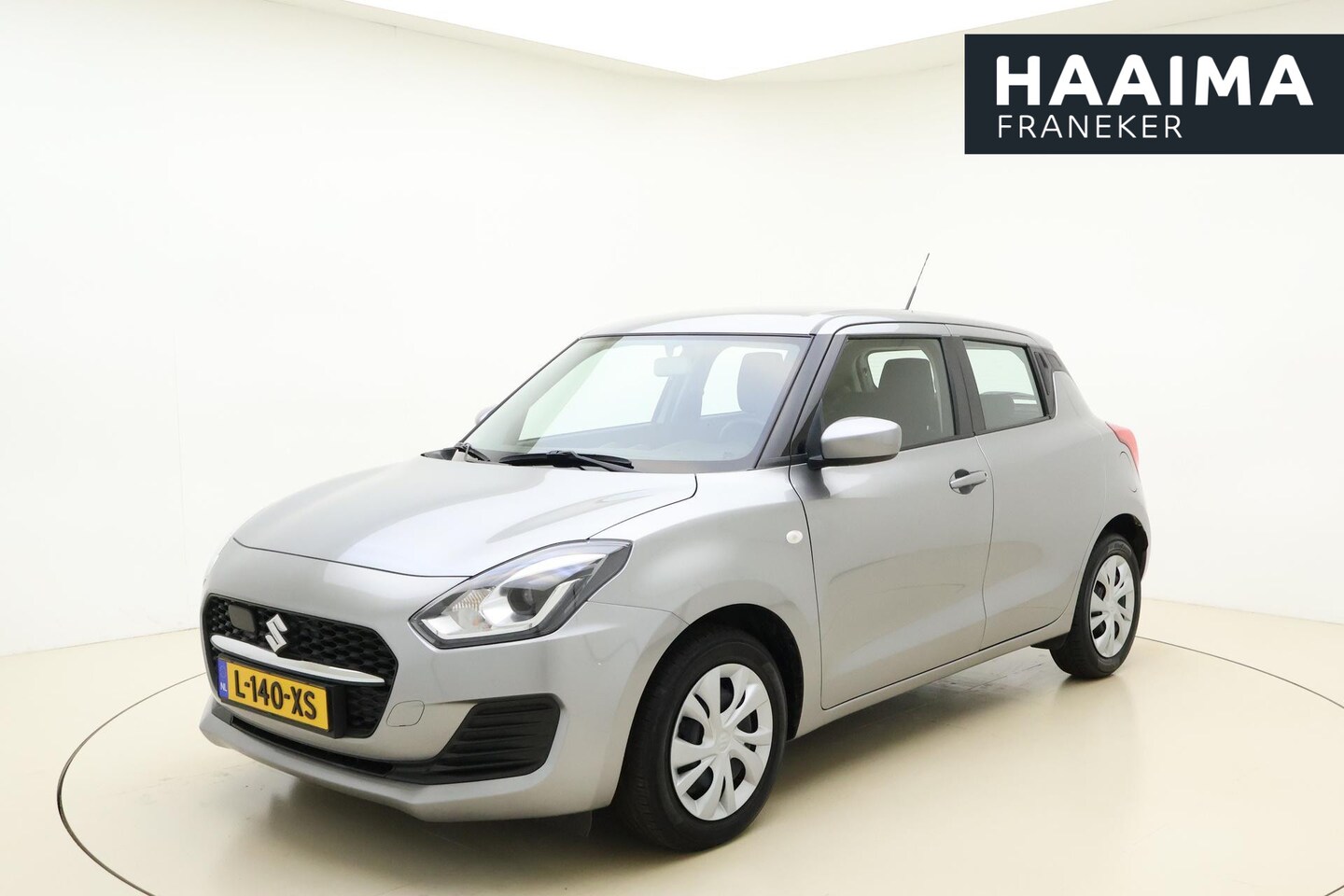 Suzuki Swift - 1.2 Comfort Smart Hybrid 83pk | Airco | Bluetooth | Radio CD | 1e Eigenaar | Weinig Kilome - AutoWereld.nl