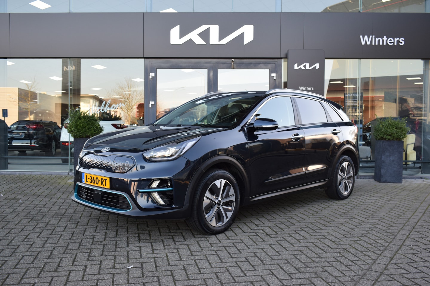 Kia e-Niro - DynamicPlusLine 64kWh 3-Fase ECC Cr.Control-Adapt. 10"Navi+Camera BT+USB Stoel+Stuurverw. - AutoWereld.nl