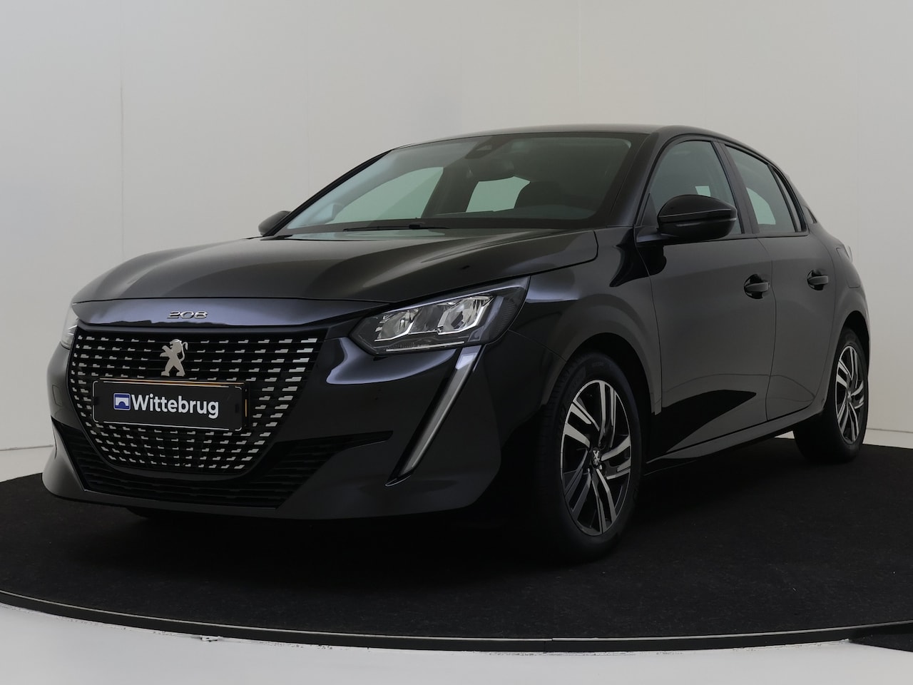 Peugeot 208 - 1.2 PureTech Allure | Navigatie | Parkeerhulp | Licht metalen Velgen | Keyless - AutoWereld.nl