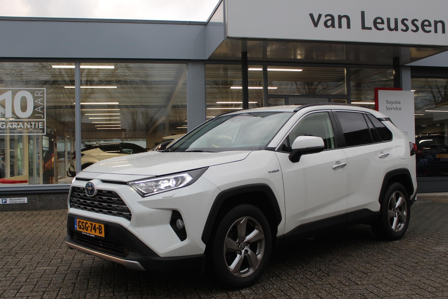 Toyota RAV4 - 2.5 HYBRID AWD EXECUTIVE APPLE/ANDROID JBL-AUDIO TREKHAAK LEER AD-CRUISE KEYLESS STOEL/STU - AutoWereld.nl