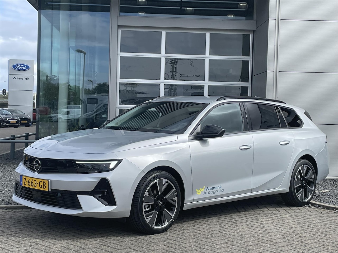 Opel Astra Sports Tourer - 54kw 156pk | DAB+ | Navigatie | Apple Carplay & Android Auto | AGR Bestuurderstoel | Parke - AutoWereld.nl