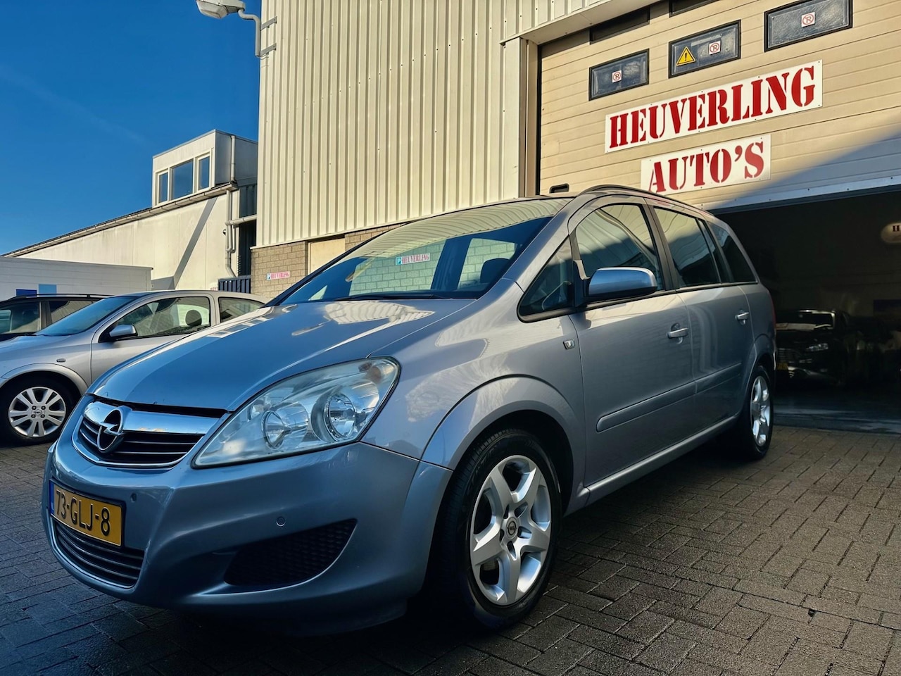 Opel Zafira - 1.8 Business|7 PERS|AIRCO|NAVI|TREKHAAK - AutoWereld.nl