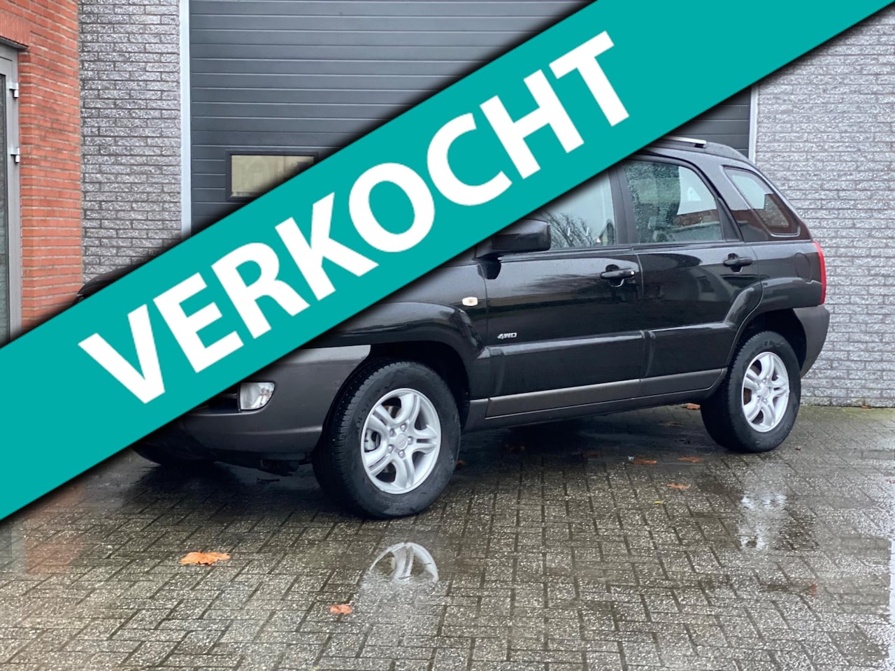 Kia Sportage - 2.7 V6 Adventure 4WD AUTOMAAT / CRUISE / CLIMA - AutoWereld.nl