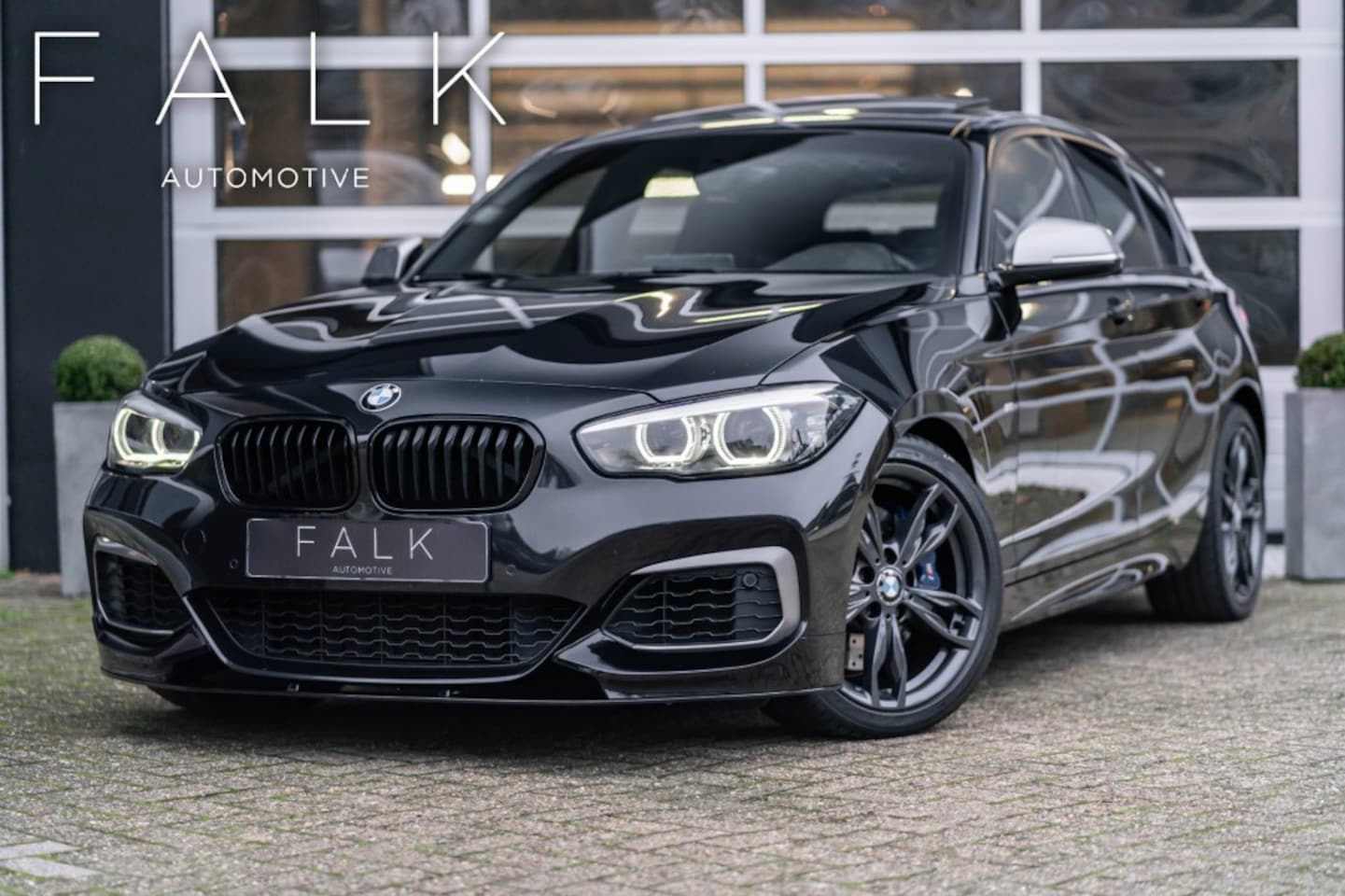 BMW 1-serie - M140I ED. HIGH EXEC AUT. H/K Schuifdak Remus Led - AutoWereld.nl