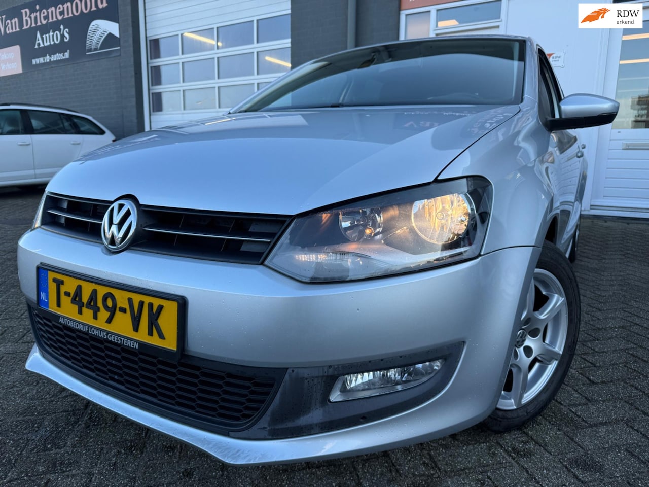 Volkswagen Polo - 1.4-16V Comfortline 5drs met airco en parkeersensoren en cruise controle - AutoWereld.nl