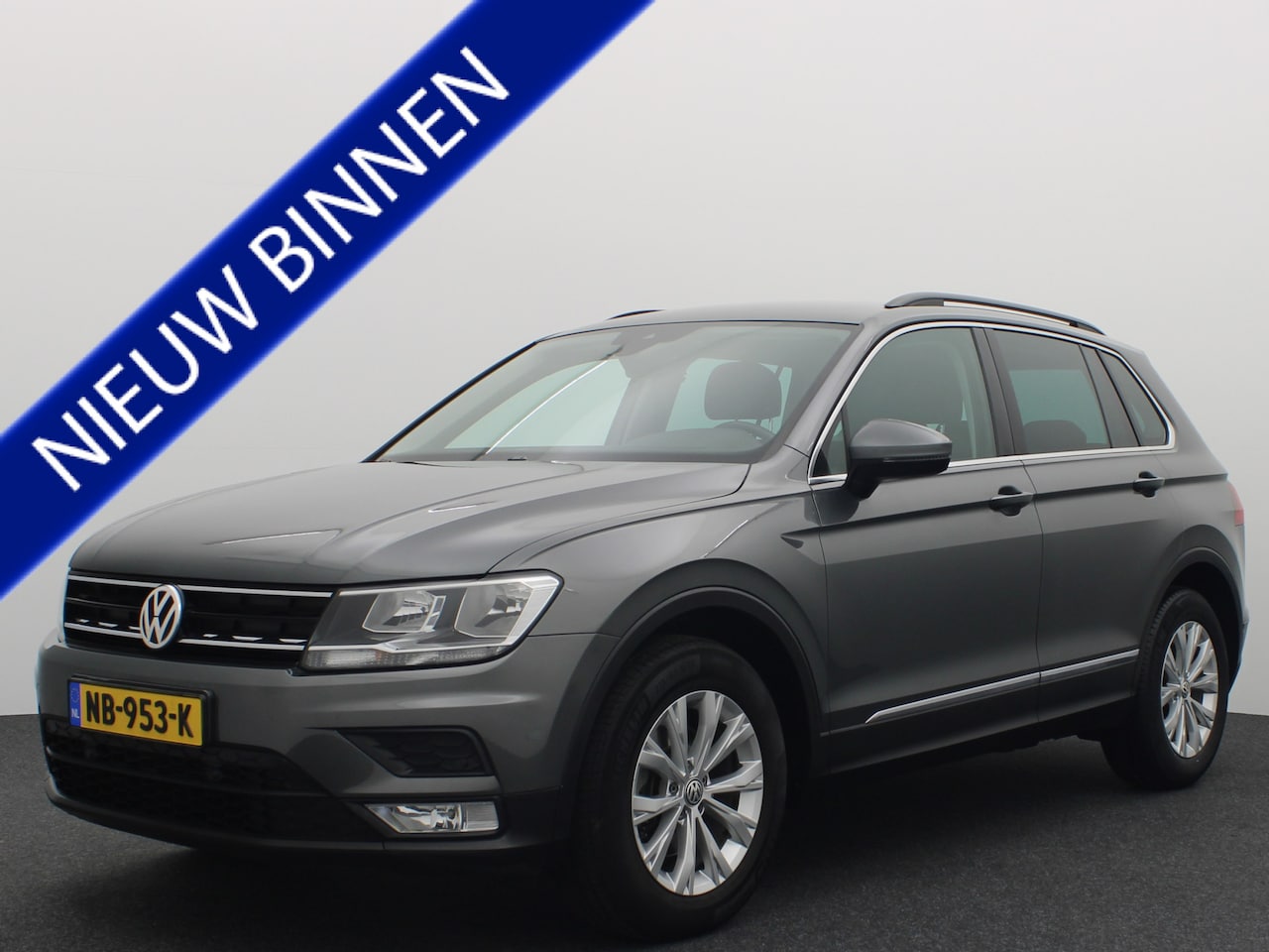 Volkswagen Tiguan - 1.4 TSI ACT Comfortline AUTOMAAT / GR NAVI / CLIMA / PDC / BLUETOOTH / CRUISE / NL-AUTO - AutoWereld.nl