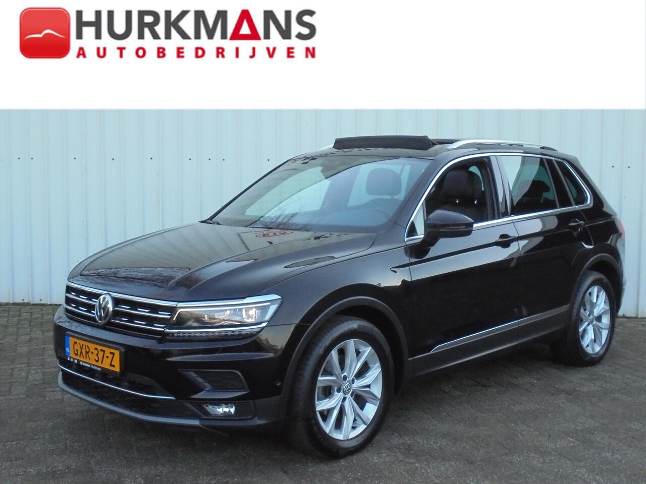 Volkswagen Tiguan - 1.5 TSI 150PK AUTOMAAT HIGHLINE PANODAK / LEER - AutoWereld.nl