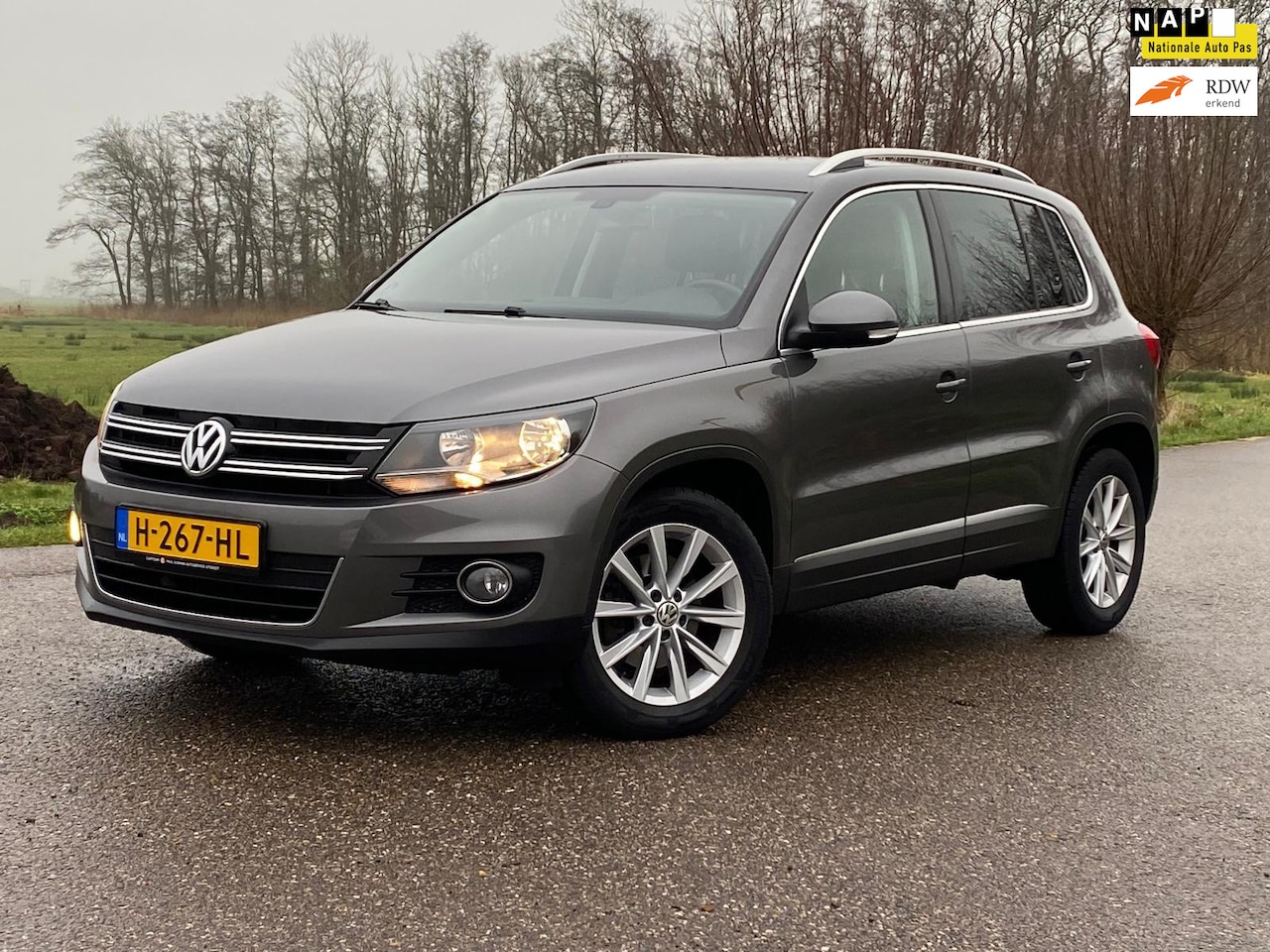 Volkswagen Tiguan - 1.4 TSI Highline 5DRS NAVI CAMERA AIRCO NAP GOED ONDERHOUDEN - AutoWereld.nl