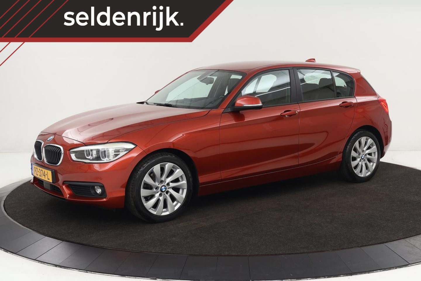 BMW 1-serie - 118i High Executive | Adaptive cruise | Leder | Trekhaak | Stoelverwarming | Full LED | Na - AutoWereld.nl