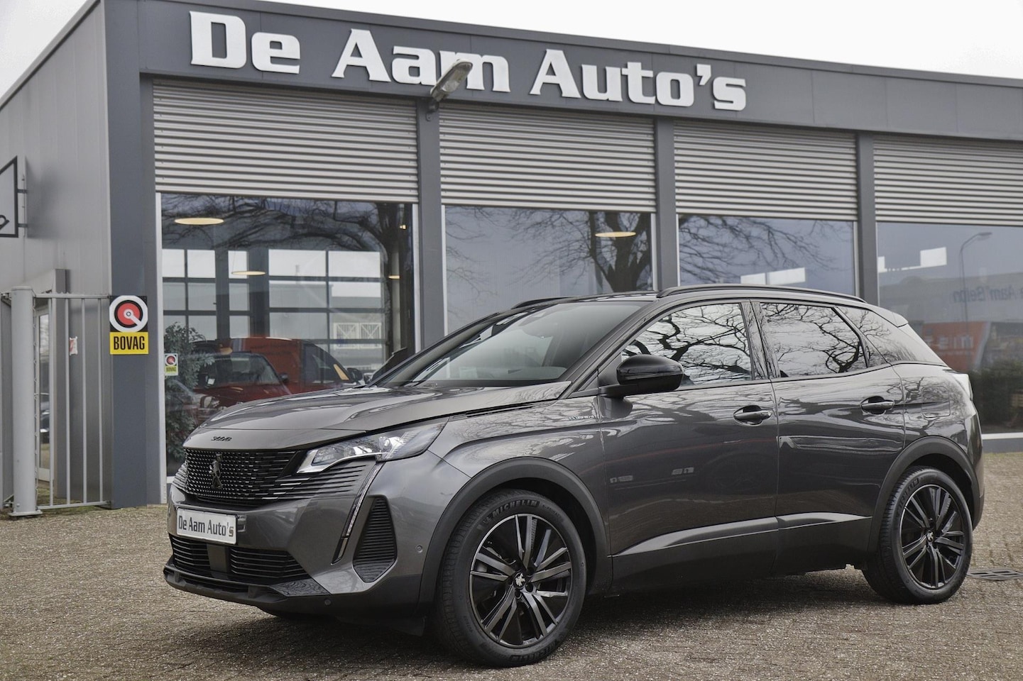 Peugeot 3008 - 1.6 hybride 4 GT 300 pk black edition - AutoWereld.nl