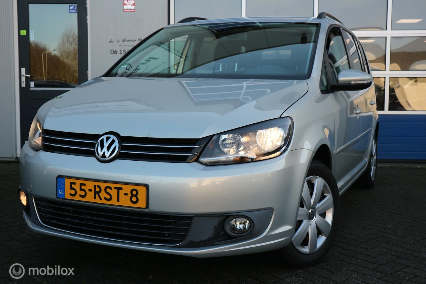 Volkswagen Touran - 1.2 TSI Comfortline BlueMotion ECC/NAVI - AutoWereld.nl