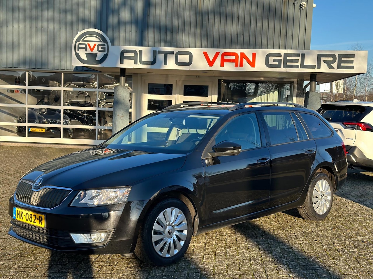 Skoda Octavia Combi - 1.6 TDI Greentech Ambition 110PK* Navi*Cruise*Airco*Elek.pak*NAP - AutoWereld.nl