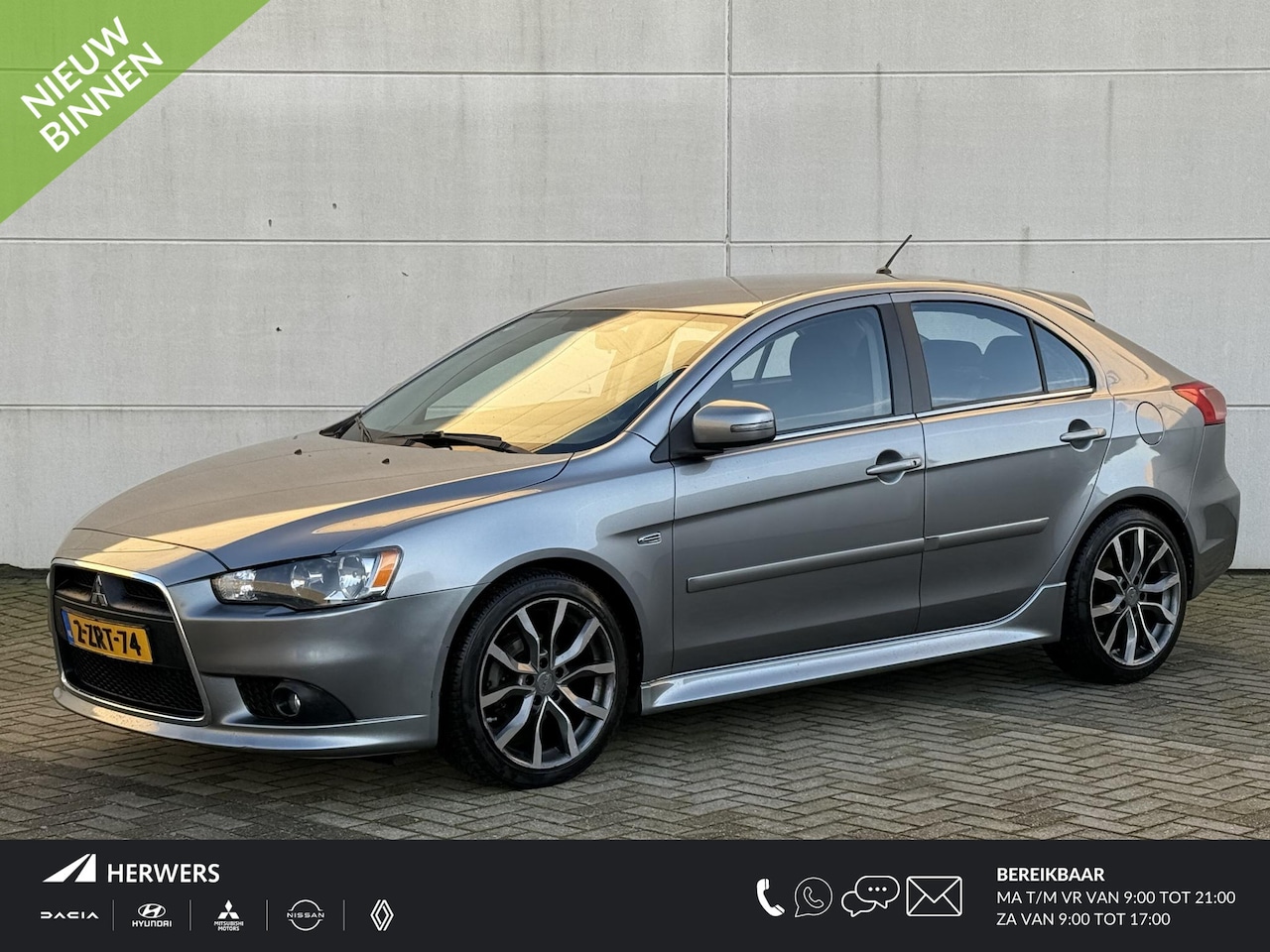 Mitsubishi Lancer Sportback - 1.6 Limited Edition / Trekhaak / All Season banden / Parkeersensoren / Stoelverwarming / C - AutoWereld.nl