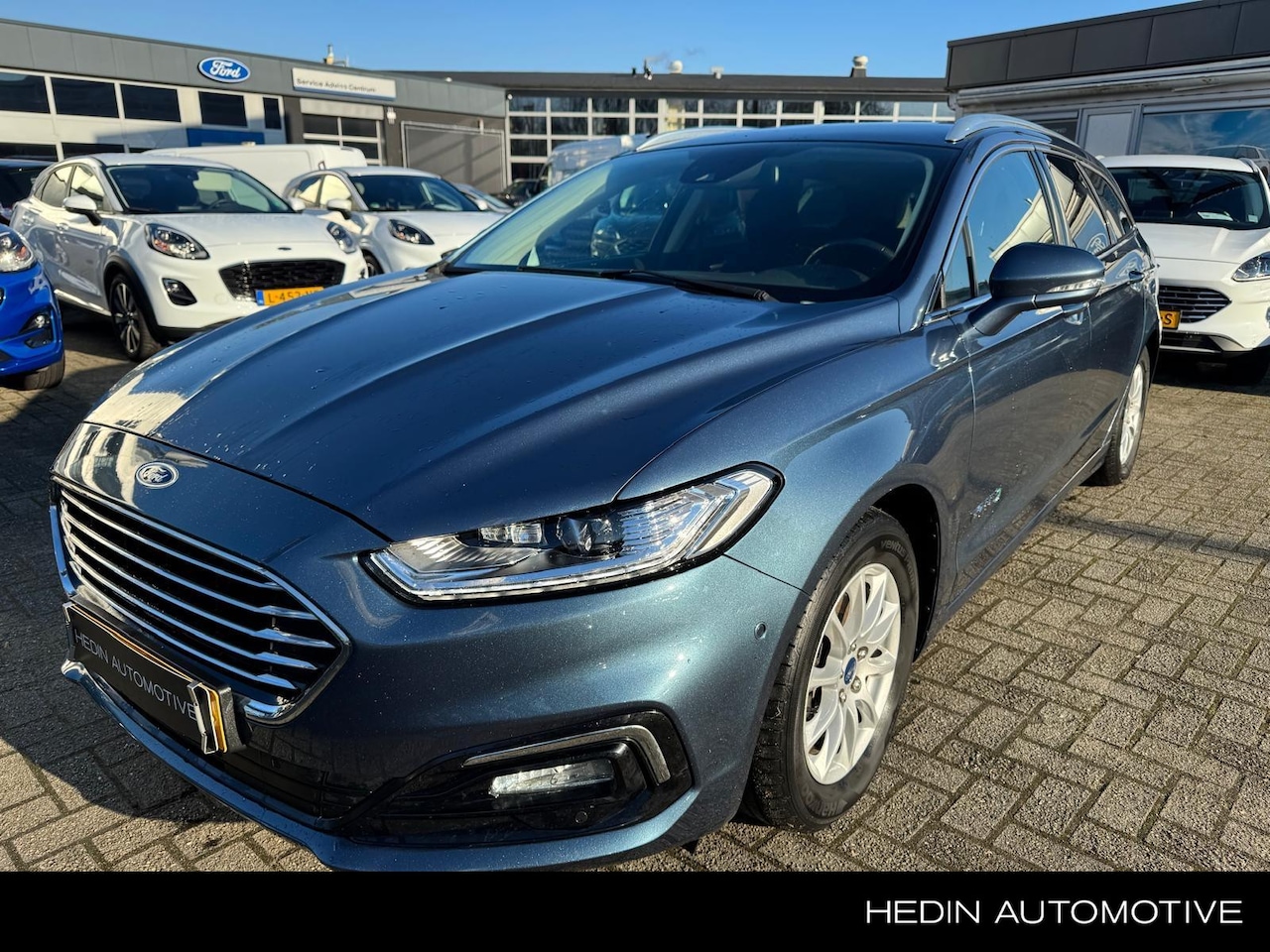 Ford Mondeo Wagon - 2.0 IVCT HEV Titanium | BLIS | SONY | Memory | Privacy glass - AutoWereld.nl