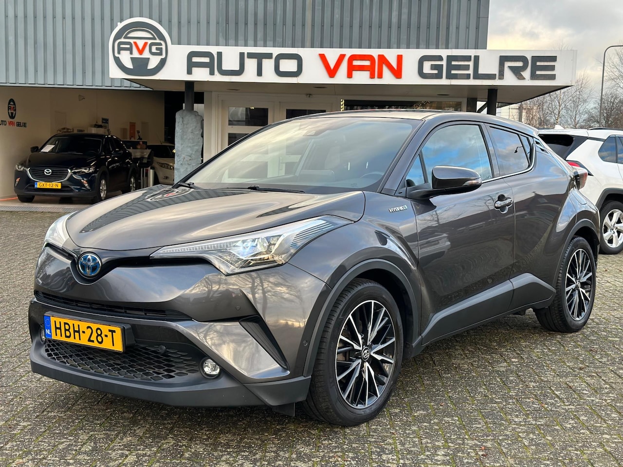 Toyota C-HR - 1.8 Hybrid Executive JBL*Navi*Camera*Leder*1e Eigenaar - AutoWereld.nl