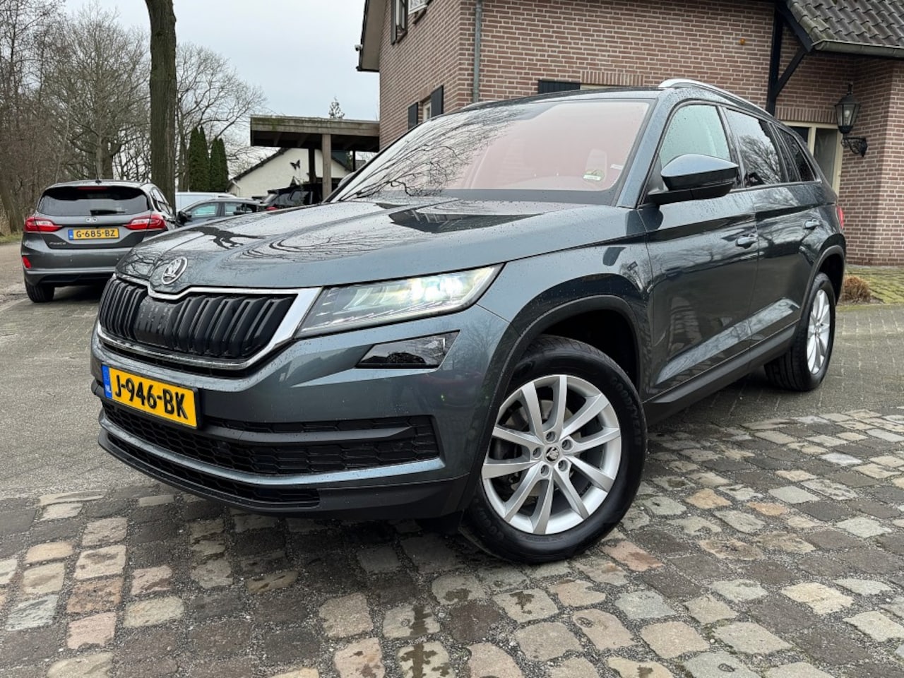 Skoda Kodiaq - 1.5 TSI Bns Ed autom ecc,1/2leer,navi,lmv,pdc,trekhaak,digidash - AutoWereld.nl