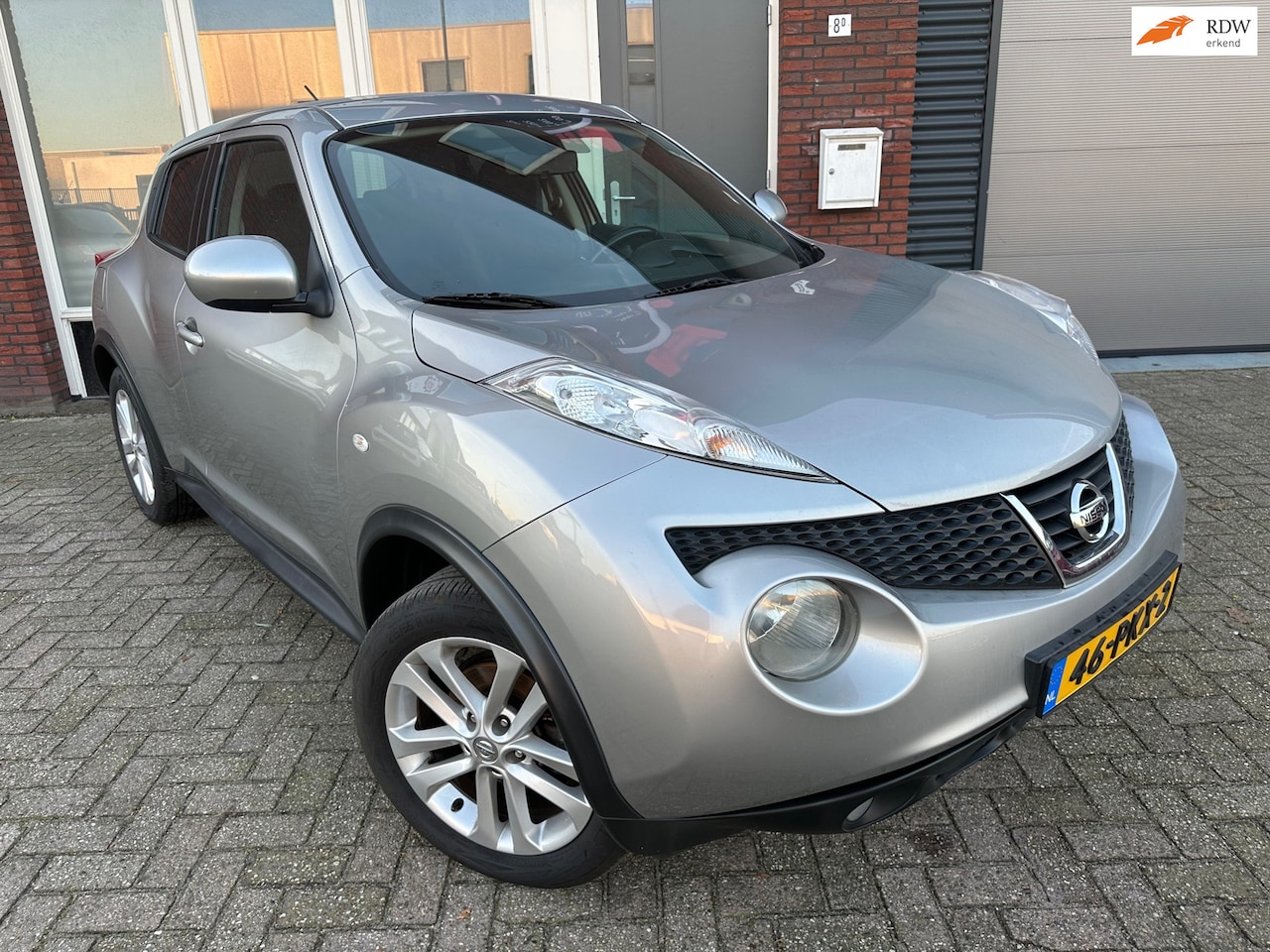 Nissan Juke - 1.6 Acenta Eco / Navi / Camera / Clima / AUX - AutoWereld.nl