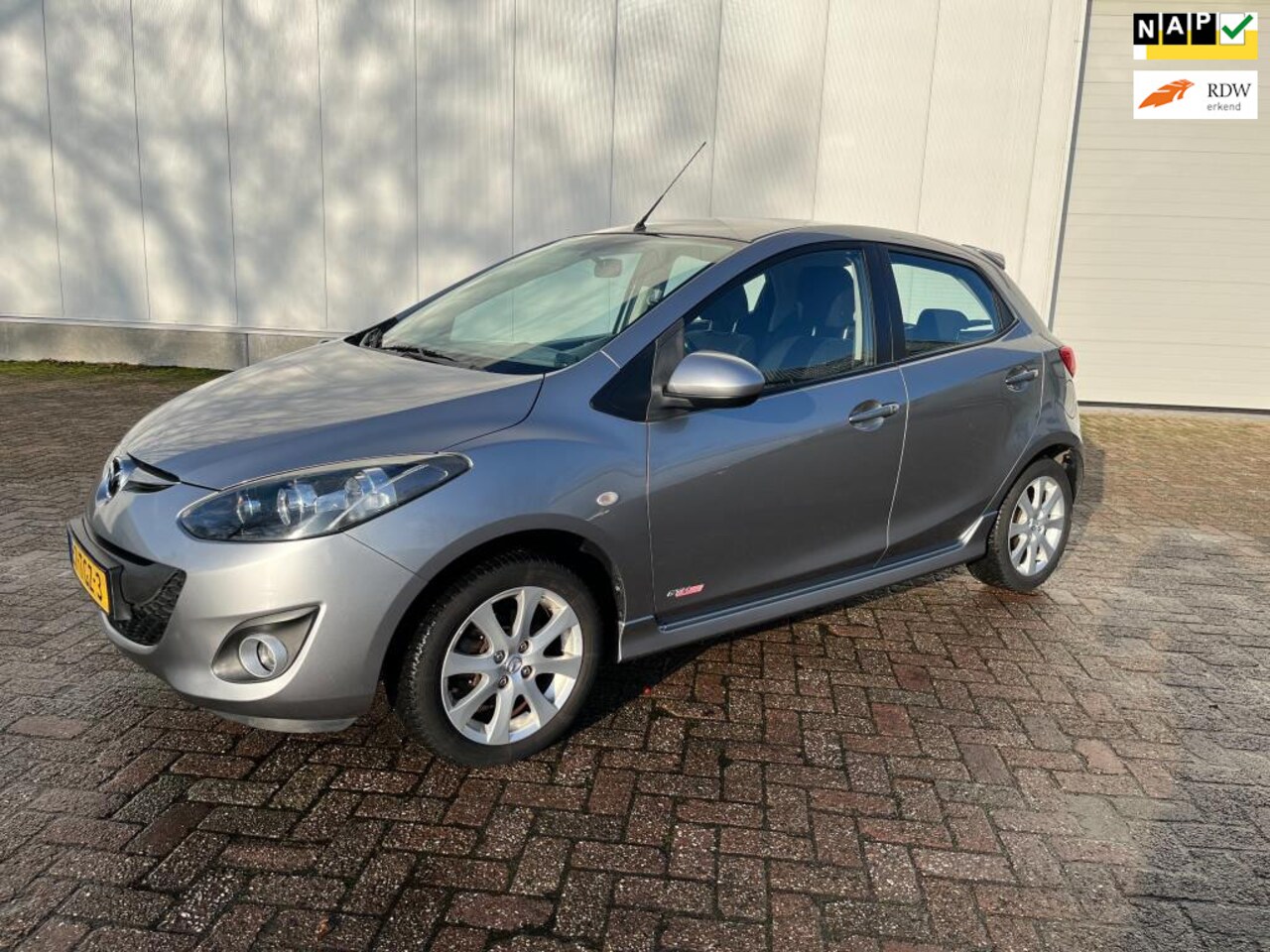 Mazda 2 - 1.3 BIFUEL GT-M Line 1e eigenaar 2012 - AutoWereld.nl