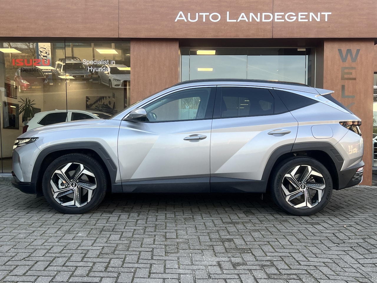 Hyundai Tucson - 1.6 T-GDI HEV Premium Sky - 360 Camera | Adapt. Cruise C. | Elektr. Stoelbediening & Verw. - AutoWereld.nl