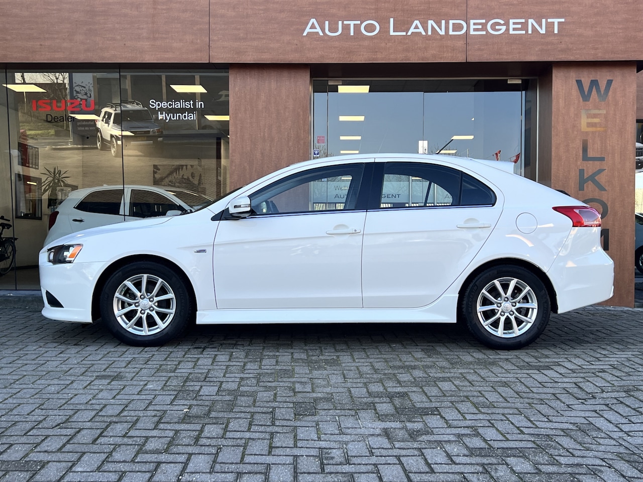 Mitsubishi Lancer Sportback - 1.6 Limited Edition 1.6 Limited Edition - AutoWereld.nl