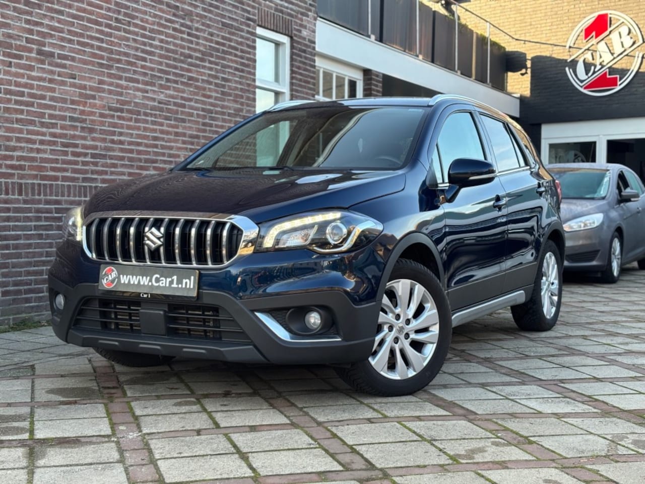 Suzuki S-Cross - 1.0 Boosterjet Select Apple CarPlay CAMERA KEYLESS TREKHAAK CLIM - AutoWereld.nl