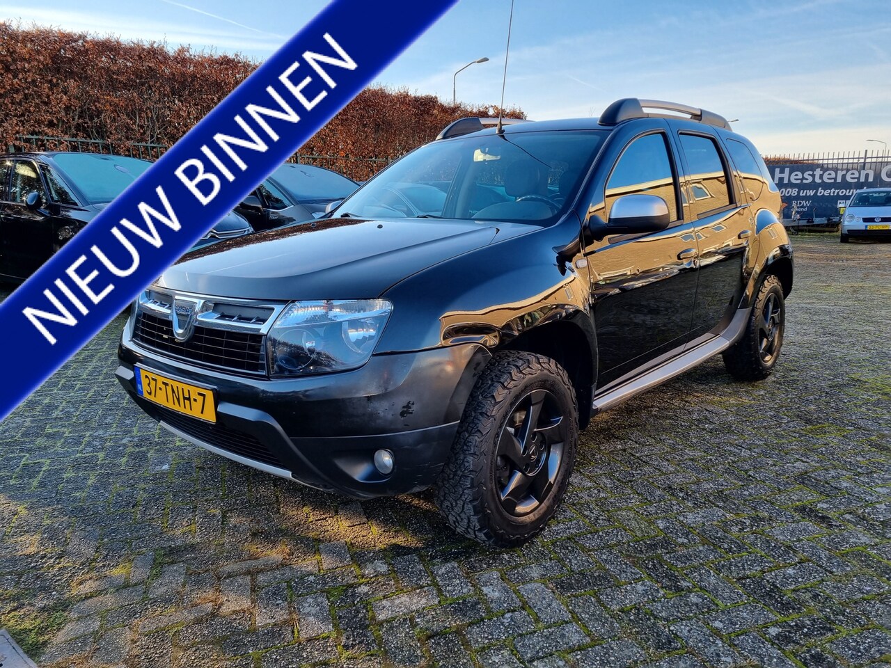 Dacia Duster - 1.6 Aniversare 4x4 AWD ✅1e EIGENAAR ✅TREKHAAK - AutoWereld.nl