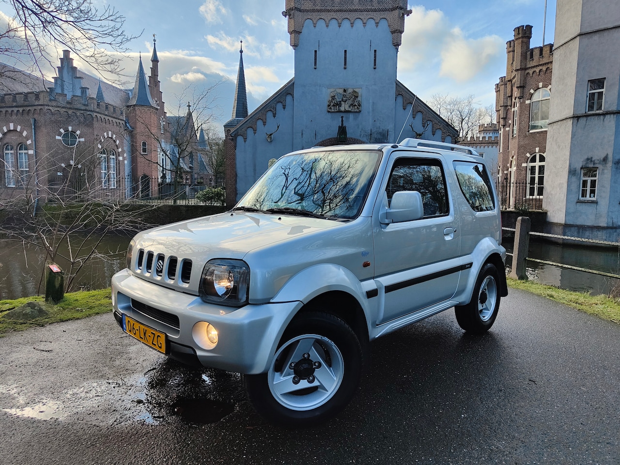 Suzuki Jimny - 1.3 Freestyle Airco / 4x4 / trekhaak / nap - AutoWereld.nl