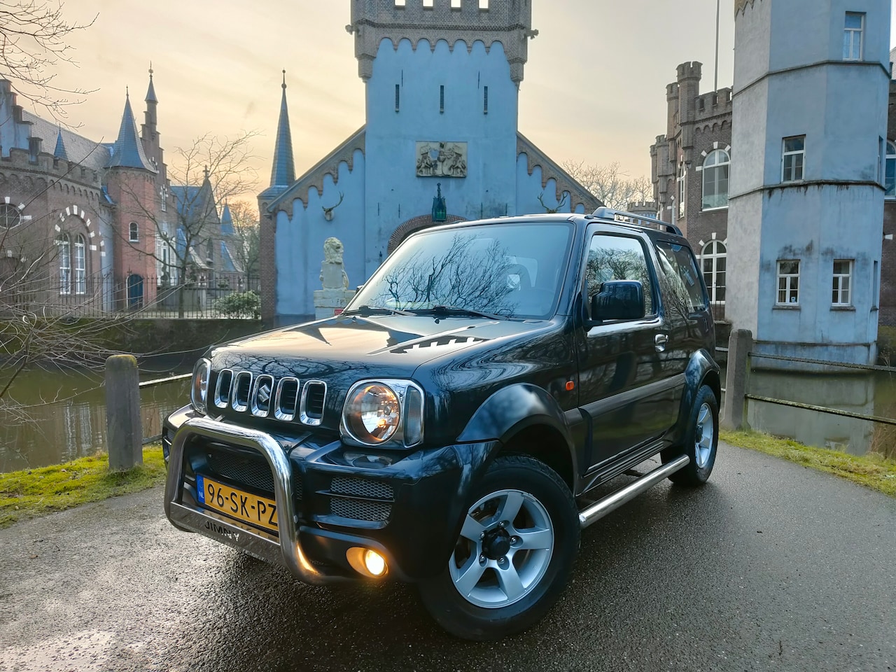 Suzuki Jimny - 1.3 Exclusive Automaat / 4x4 / apk 2-2026 / NAP - AutoWereld.nl