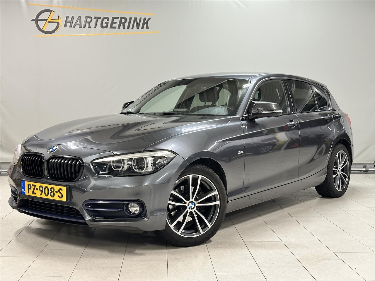 BMW 1-serie - (f20) 118i 136pk Automaat Sport Shadow Executive / Navi / ECC / Cruise / PDC - AutoWereld.nl