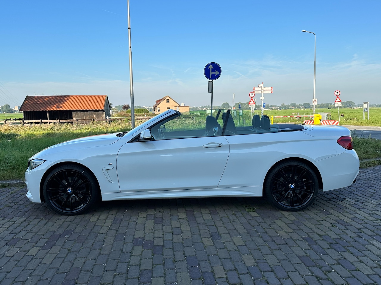 BMW 4-serie Cabrio - 430i xDrive High Executive - AutoWereld.nl