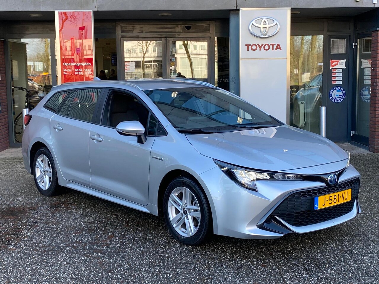 Toyota Corolla Touring Sports - 1.8 HYBRID ACTIVE APPLE/ANDROID LM-VELGEN CAMERA AD-CRUISE NL-AUTO - AutoWereld.nl