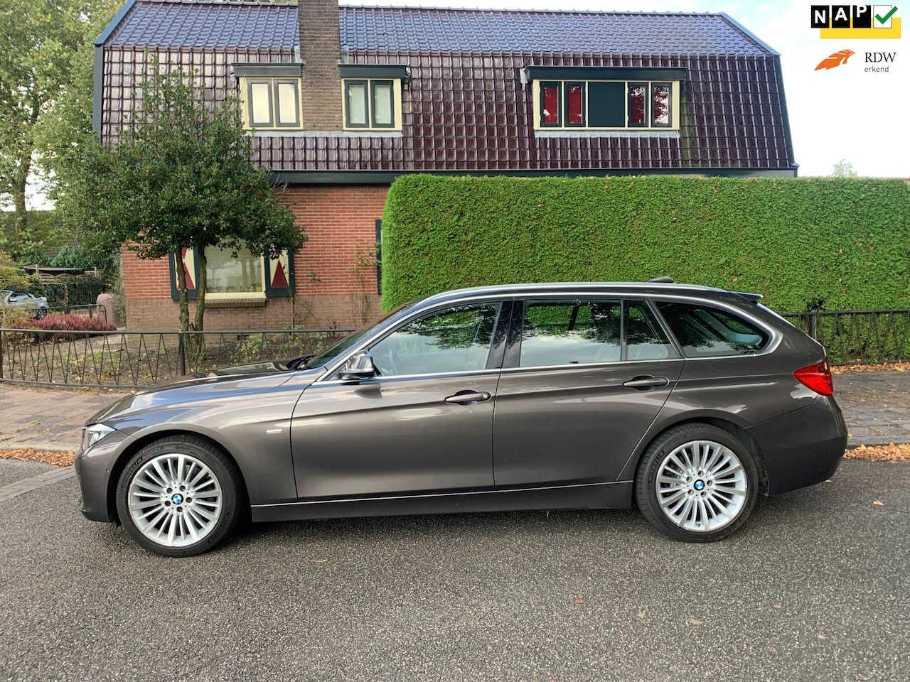 BMW 3-serie Touring - 328i XDrive 245PK leder navigatie keyless camera PDC - AutoWereld.nl