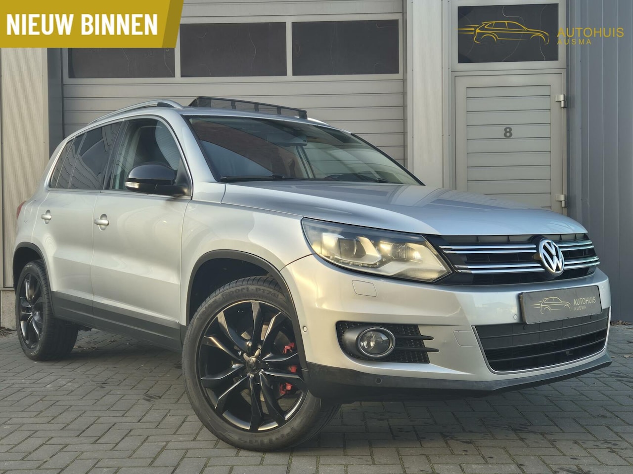 Volkswagen Tiguan - 2.0 TSI Sport&Style Pano/Leer/Cruise/211PK - AutoWereld.nl