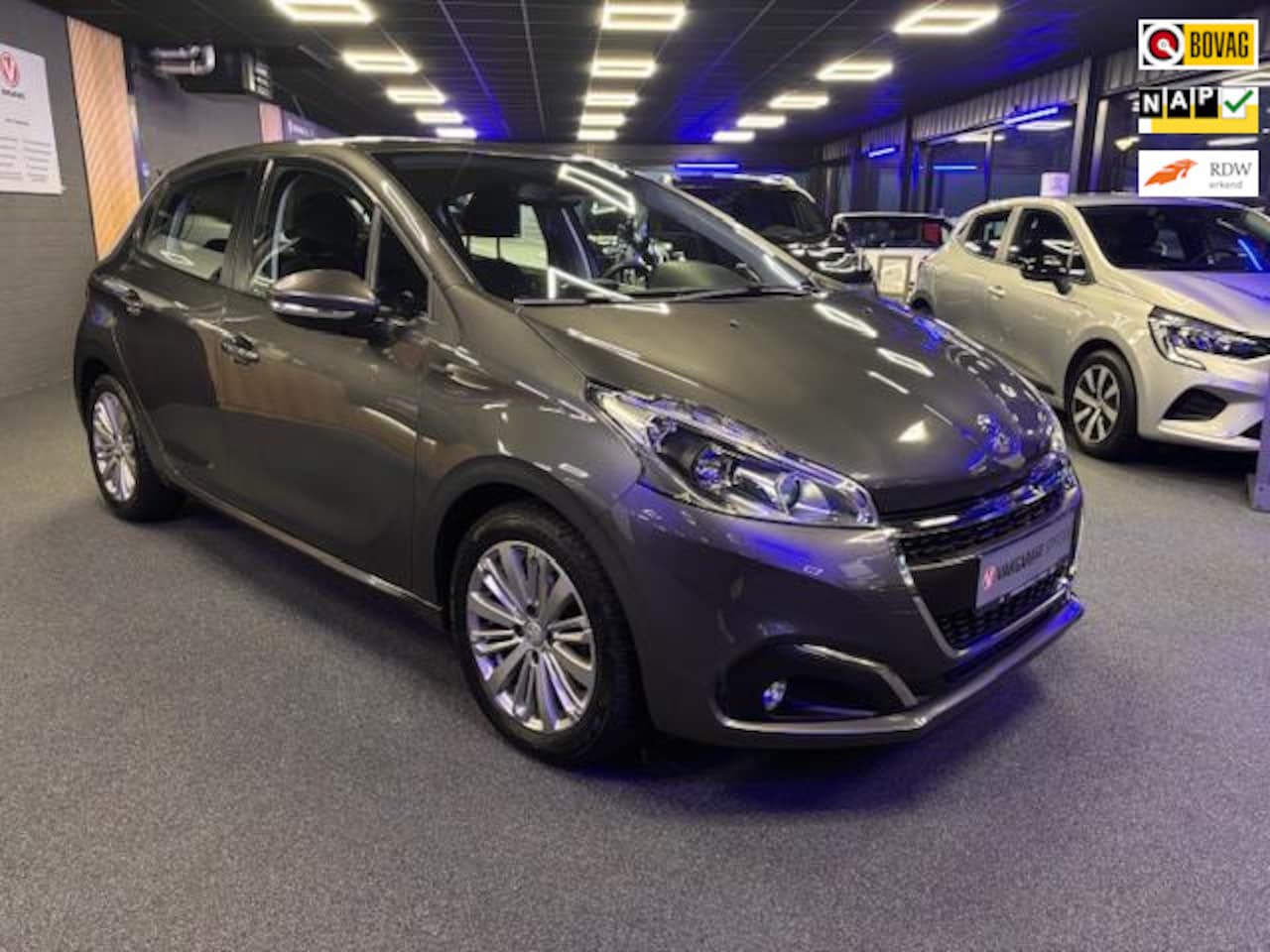 Peugeot 208 - 1.2 Signature | Cruise | Clima | Camera | Dealeronderhouden | All-Season Banden | IsoFix | - AutoWereld.nl