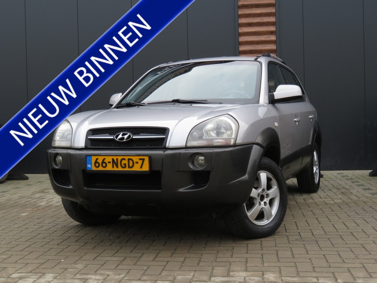 Hyundai Tucson - 2.0i Active Airco Trekhaak - AutoWereld.nl