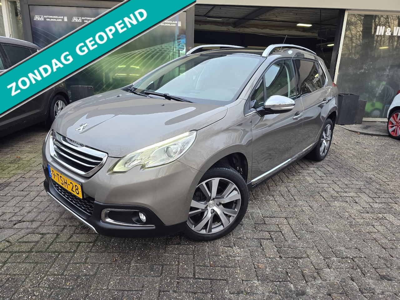 Peugeot 2008 - 1.6 VTi Féline | 12MND GARANTIE | NW APK | AIRCO | NAVI | PDC | PANO DAK | - AutoWereld.nl