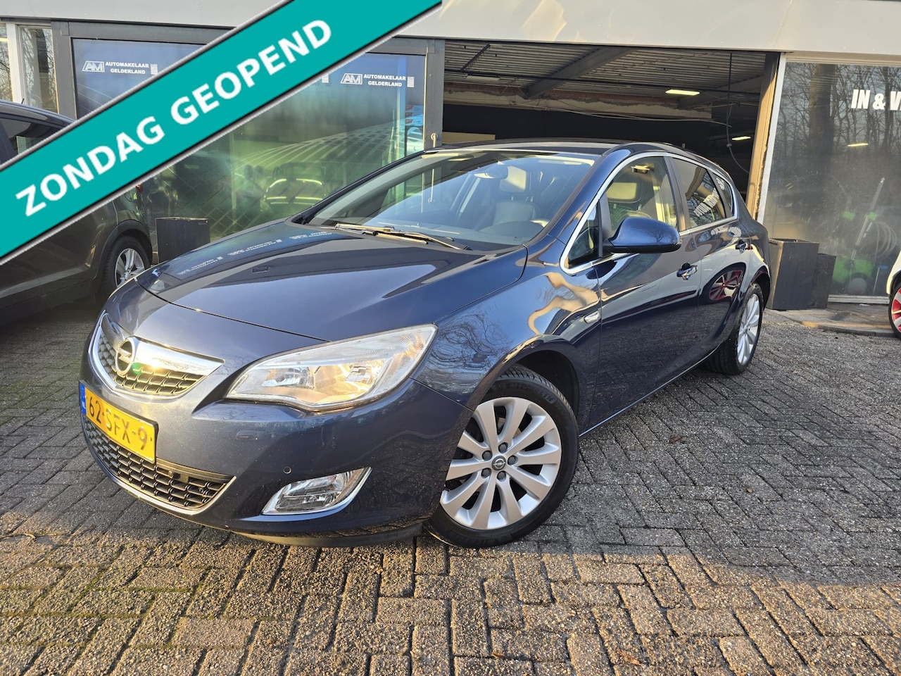 Opel Astra - 1.4 Turbo Cosmo | 2E EIGENAAR | 12MND GARANTIE | NAVI | STOELVERWARMING | LEDER | - AutoWereld.nl