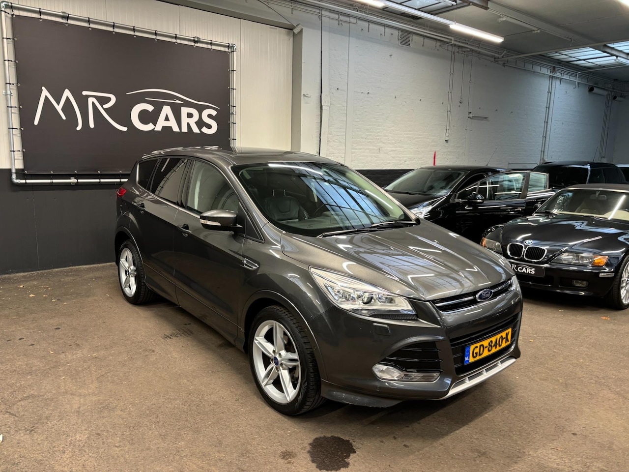 Ford Kuga - 1.5 Titanium Plus Leder/Navi/Panodak/Climate Control - AutoWereld.nl