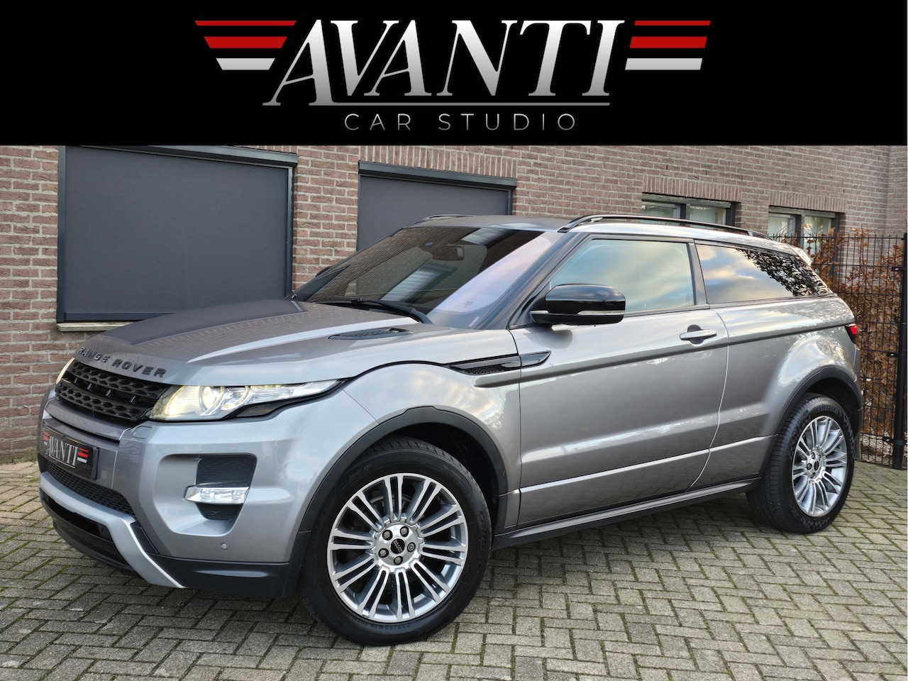 Land Rover Range Rover Evoque Coupé - 2.0 Si 4WD Dynamic COUPE PANO NAVI AUTOMAAT DUAL VIEW SCREEN STUUR STOELVERWARMING LEDER E - AutoWereld.nl