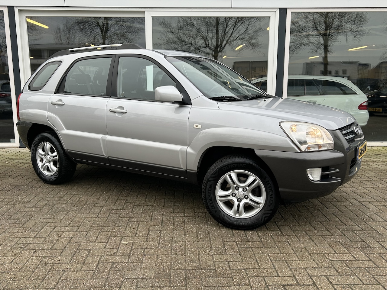 Kia Sportage - 2.0 CVVT Executive Cruise / Trekhaak / Half Leder / Clima - AutoWereld.nl