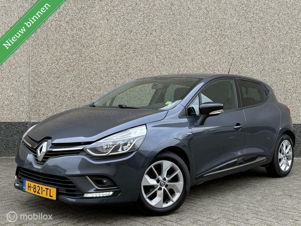 Renault Clio - 1.2 16V Limited Airco Cruise Navigatie Apk 2017 - AutoWereld.nl