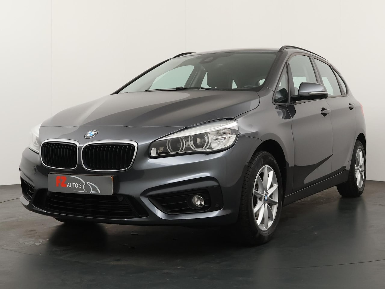 BMW 2-serie Active Tourer - 218i High Executive Trekhaak|Airco|Navigatie|Cruise controle - AutoWereld.nl