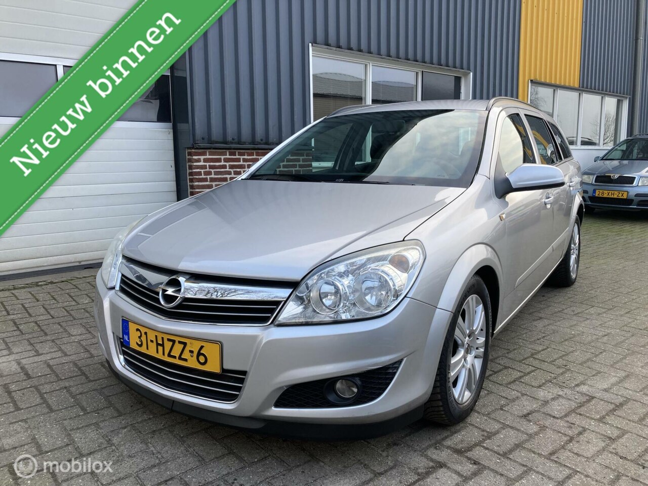 Opel Astra Wagon - 1.6 Essentia TREKHAAK! - AutoWereld.nl