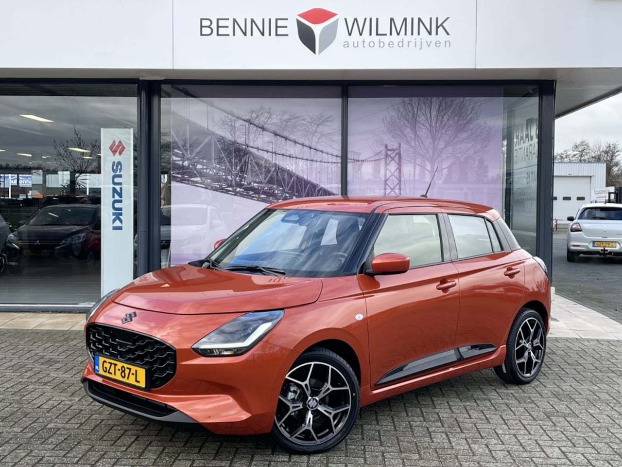 Suzuki Swift - 1.2 Sportline Smart Hybrid - AutoWereld.nl