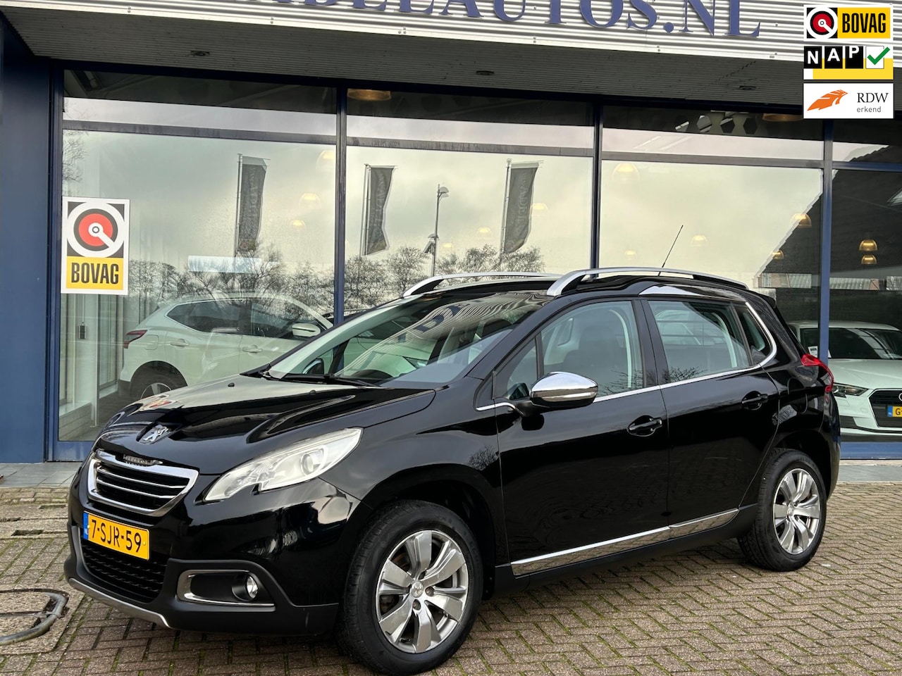 Peugeot 2008 - 1.2 VTi Allure Half Leer Navi Clima Cruise Park.Sens NAP NL-Auto Dealeronderhouden! - AutoWereld.nl