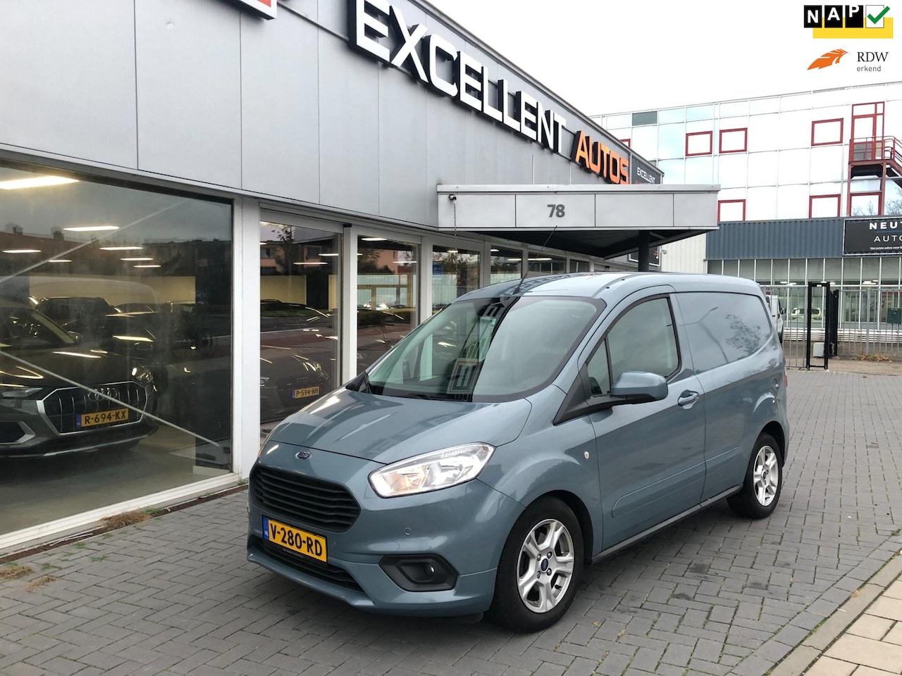 Ford Transit Courier - 1.5 TDCI Limited - Airco - Navigatie - AutoWereld.nl